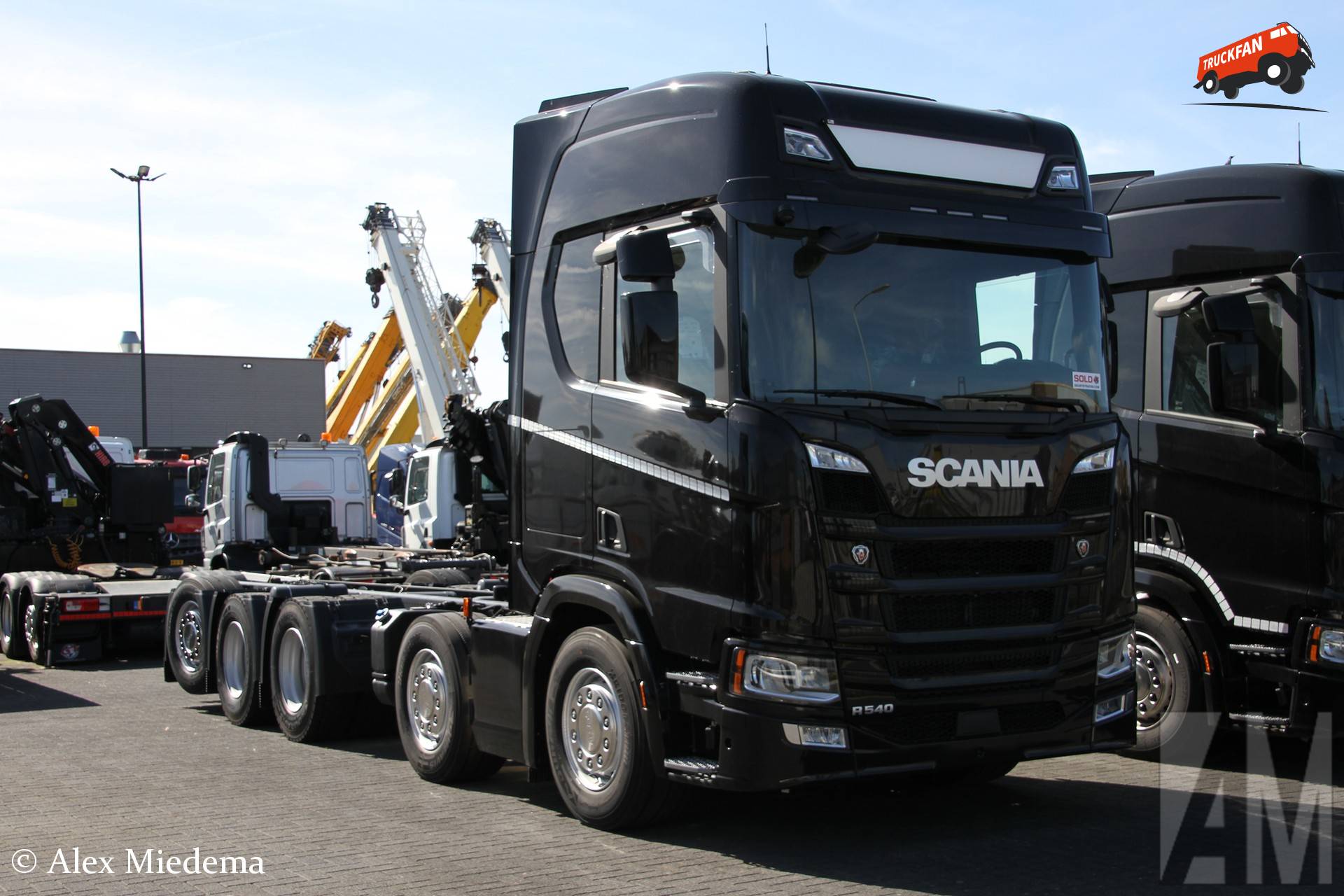 Scania R540 10x4 vrachtwagen in Andelst