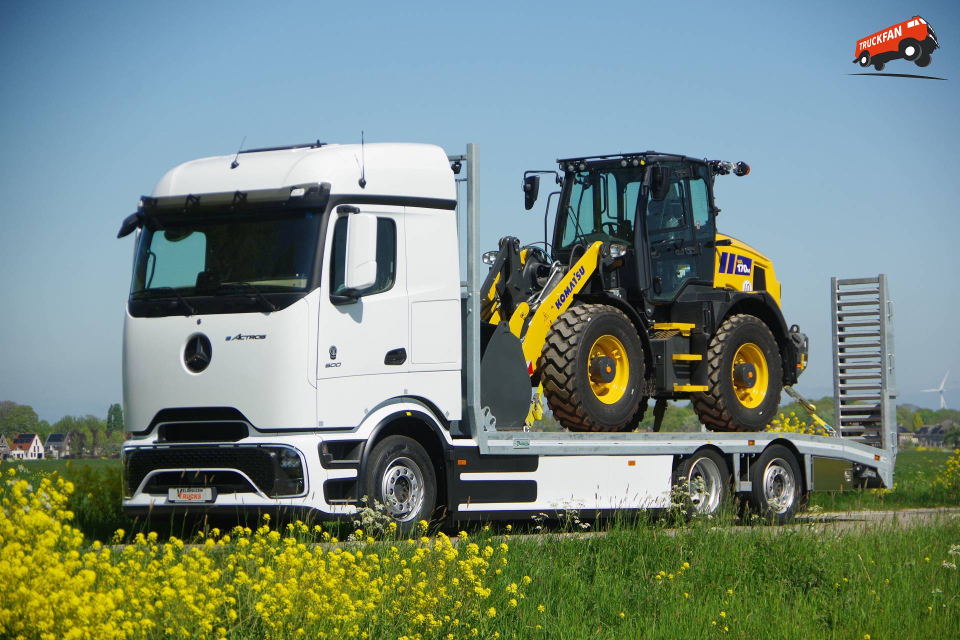 Mercedes-Benz eActros 600 elektrische oprijwagen met Komatsu shovel
